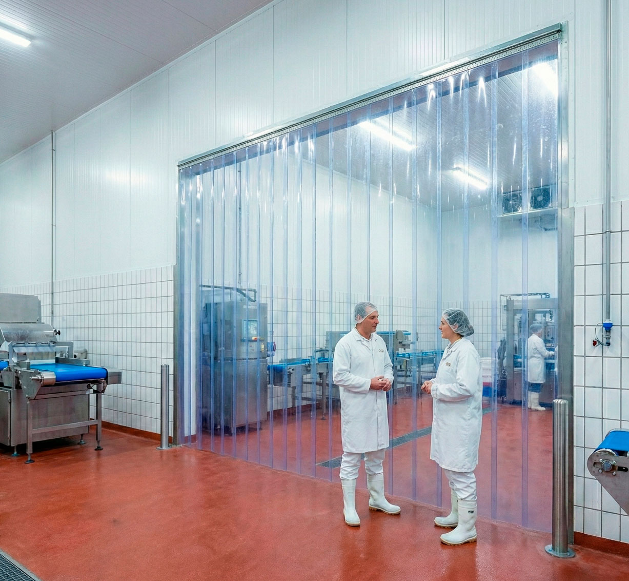 Cortina industrial lamas PVC transparente para aislamiento térmico naves